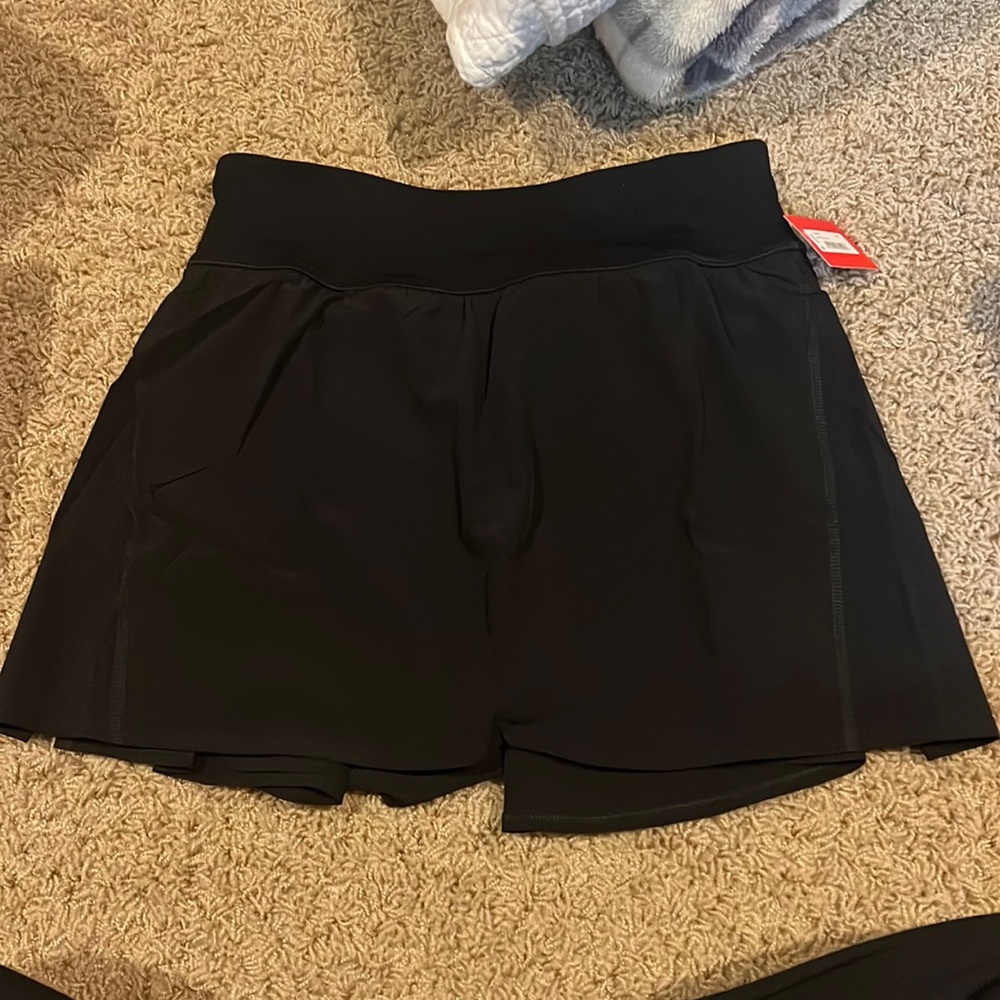 Brand New. Spanx. Get Moving Skort. Size medium
